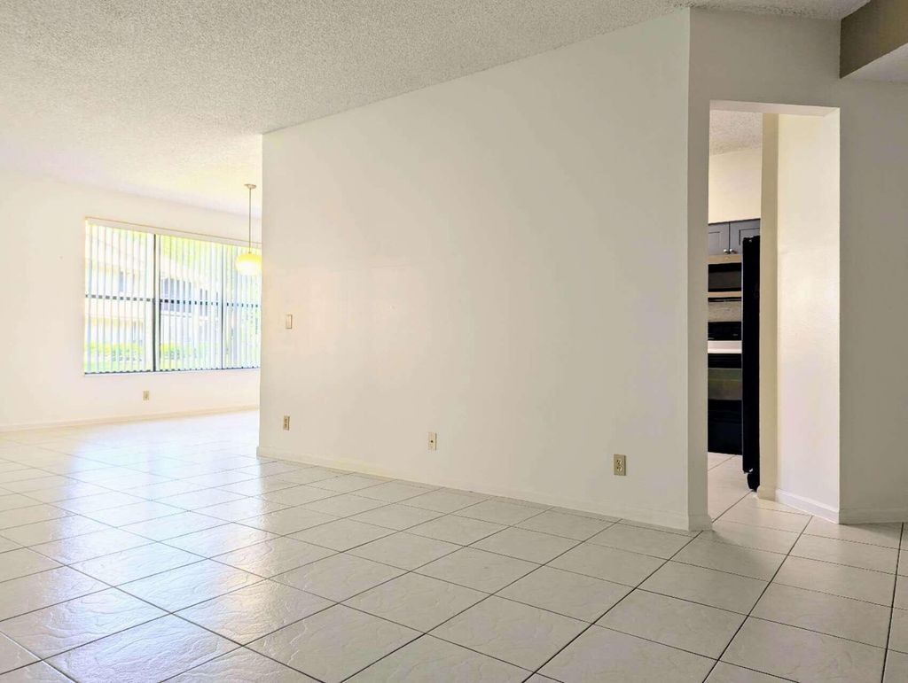 Photo of 5760 Coach House Circle #A, Boca Raton, FL 33486 (MLS # R11091177)