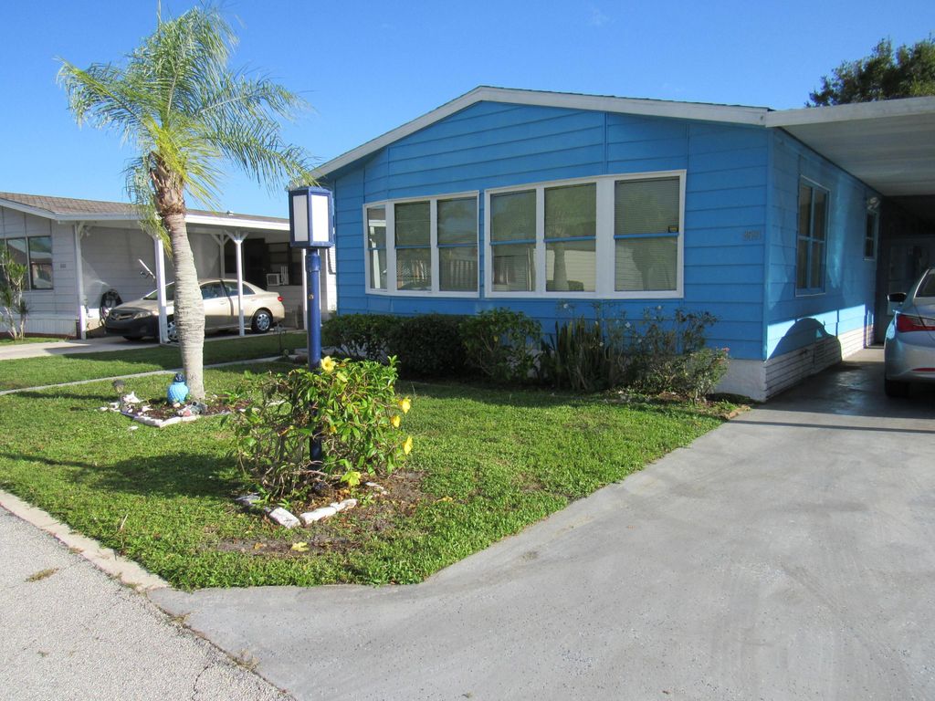 Photo of 8591 Mary Ann Lane, Port Saint Lucie, FL 34952 (MLS # R11124534)