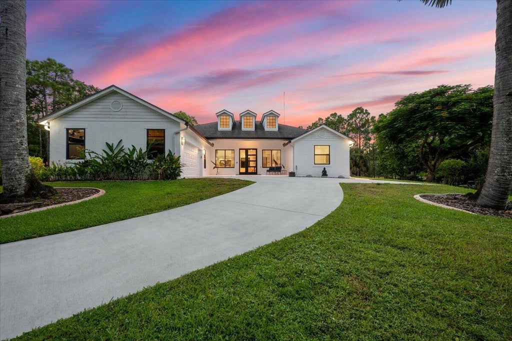 Photo of 6723 Audubon Trail, Lake Worth, FL 33449 (MLS # B26069854)