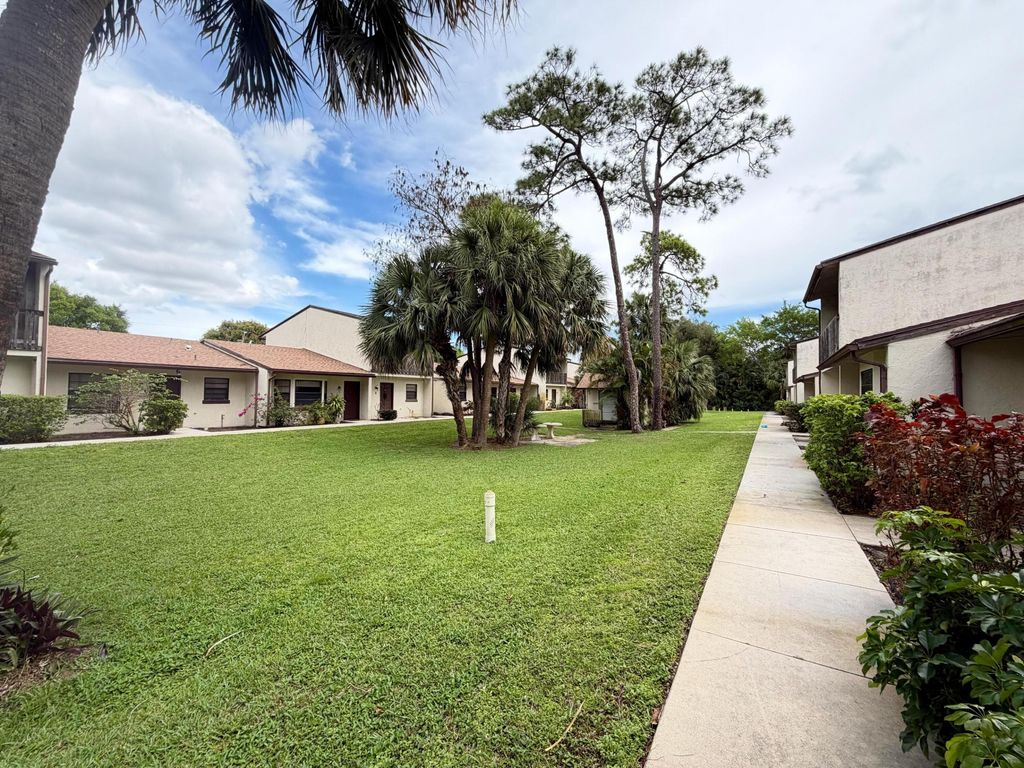 Photo of 1226 N Haverhill Road #Unit 3, Haverhill, FL 33417 (MLS # B26005063)