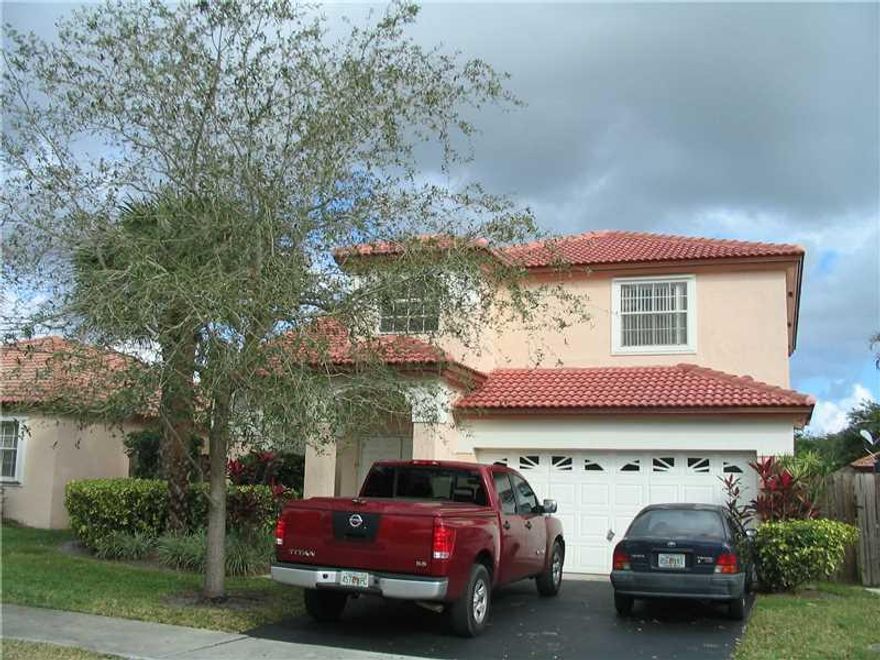 4 BEDROOM 2.5 BATH 2 STORY HOME IN WINSTON PARK,NEWER ROOF,TILE FLOORS,EAT-IN KITCHEN,WALK-IN CLOSET IN MASTER BEDROOM,2 CAR GARAGE,IN GATED COMMUNITY OF CYPRESS LAKES,A RATED SCHOOLS.ROOF IS APROX. 2 YRS.NEW