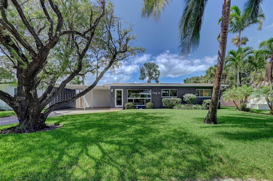 This beautifully renovated, fully permitted, 3/2 mid-century home in the heart of Wilton Manors boasts impeccable modern upgrades and curb appeal. The custom kitchen features Quartz countertops, sylish backsplash, and Bosch appliances, providing a sleek and functional space. Both bathrooms have been completely remodeled, exuding a contemporary charm with updated fixtures and finishes. New flooring throughout creates an elegant flow from room to room. The house has undergone extensive rewiring, and all cast iron replaced with PVC . With a 2017 roof, 2021 impact windows and doors, this home combines both structural integrity and aesthetics. Spacious back yard features a new pool with salt water filatration and travertine patio. Located just blocks from Wilton Drive offers a prime location .