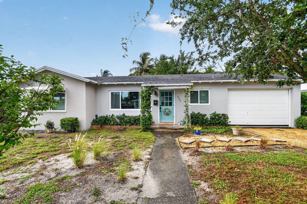 Photo of 338 Edmor Road, West Palm Beach, FL 33405 (MLS # B26046056)