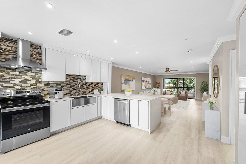 Photo of 18 Stratford Drive E #F, Boynton Beach, FL 33436 (MLS # R11140272)