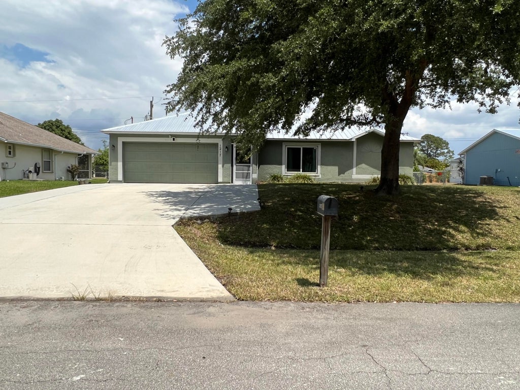 Photo of 1217 SW Asturia Avenue, Port Saint Lucie, FL 34953 (MLS # R10792720)