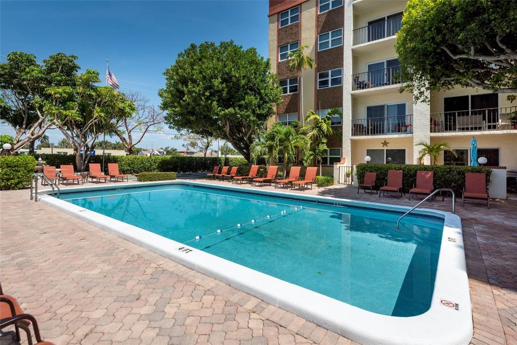 Photo of 400 N Riverside Drive #106, Pompano Beach, FL 33062 (MLS # F10541217)