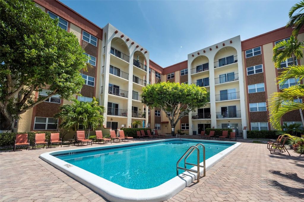 Photo of 400 N Riverside Drive #106, Pompano Beach, FL 33062 (MLS # F10541217)
