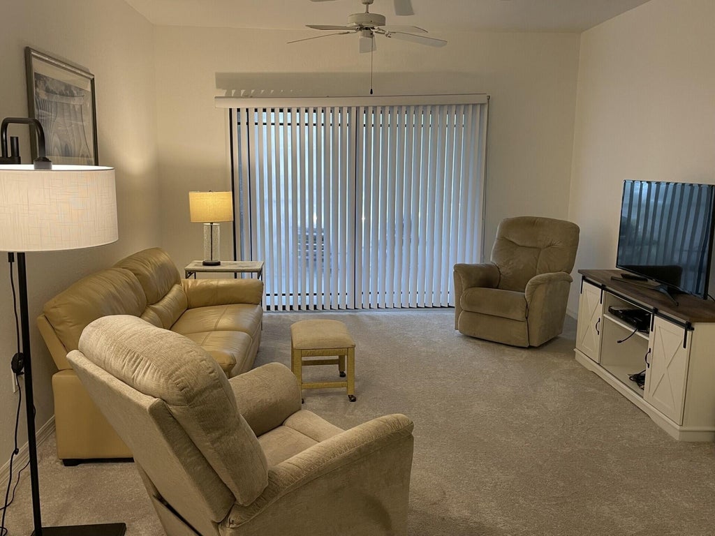 Photo of 3023 Alcazar Place #106, Palm Beach Gardens, FL 33410 (MLS # B26072530)