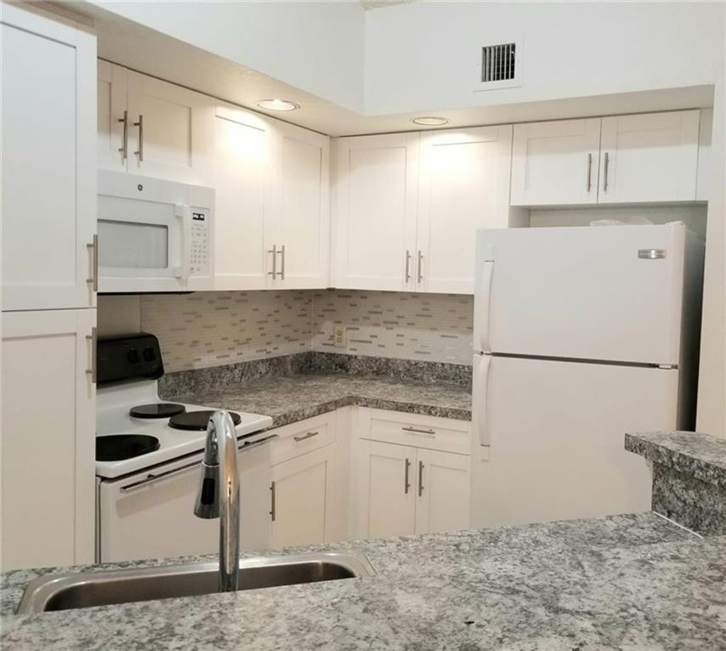 Photo of 3430 Pine Walk Drive #824, Margate, FL 33064 (MLS # F10556711)