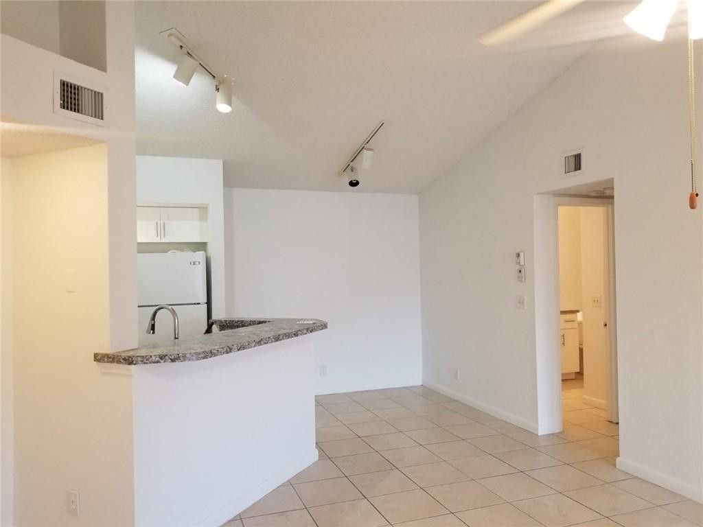 Photo of 3430 Pine Walk Drive #824, Margate, FL 33064 (MLS # F10556711)