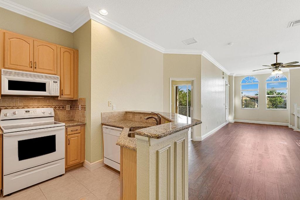 Photo of 4910 Bonsai Circle #210, Palm Beach Gardens, FL 33418 (MLS # R10951213)