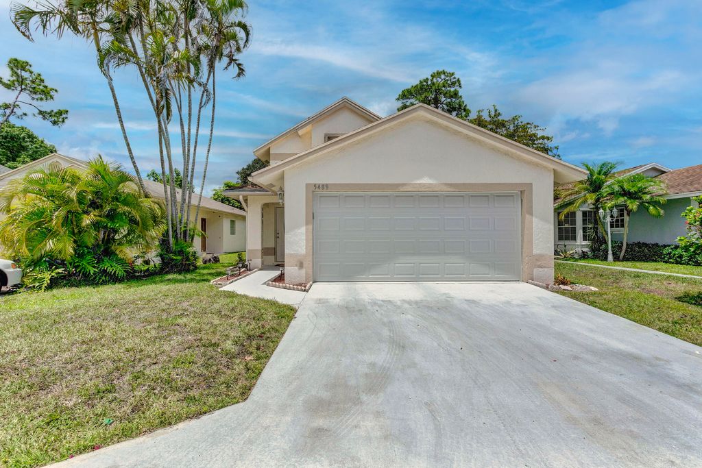 Photo of 5489 Berry Blossom Way E, West Palm Beach, FL 33415 (MLS # R10799386)