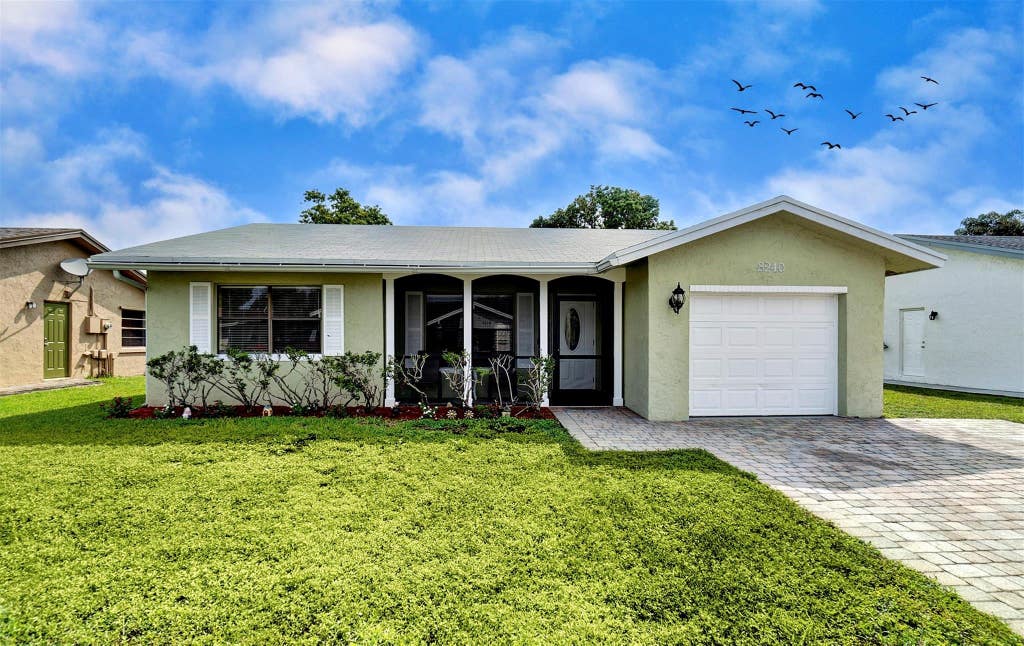 Photo of 8240 NW 94th Avenue, Tamarac, FL 33321 (MLS # F10526376)