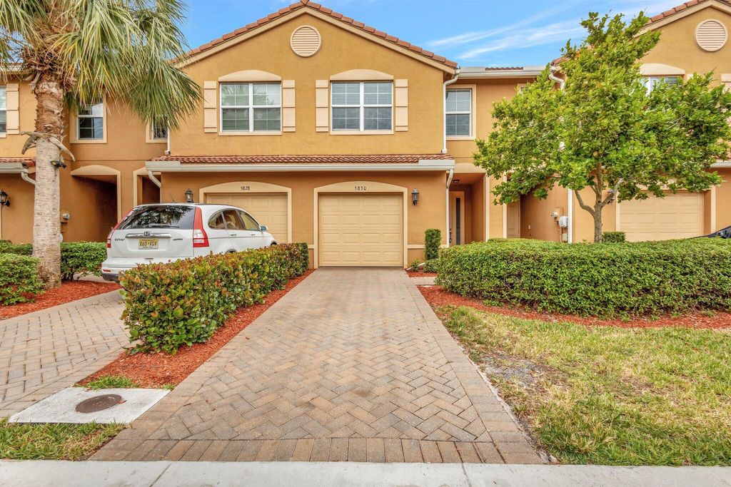 Photo of 5830 Monterra Club Drive, Lake Worth, FL 33463 (MLS # R11088179)
