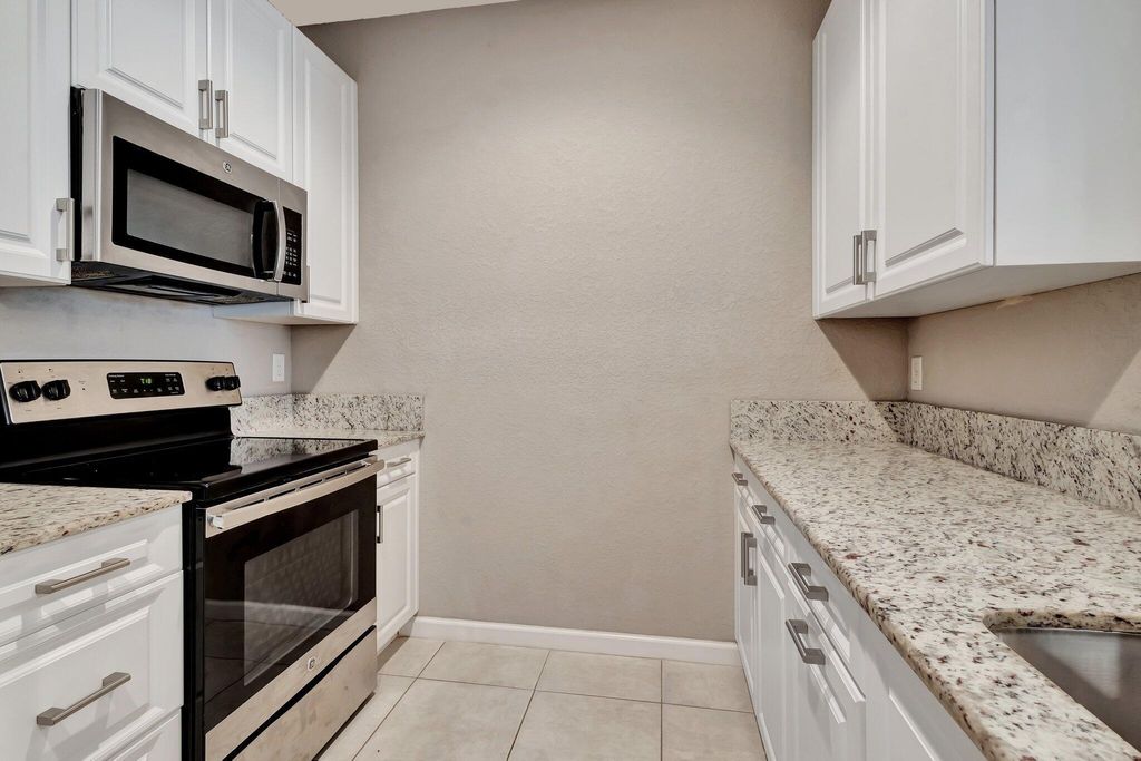 Photo of 5830 Monterra Club Drive, Lake Worth, FL 33463 (MLS # R11088179)