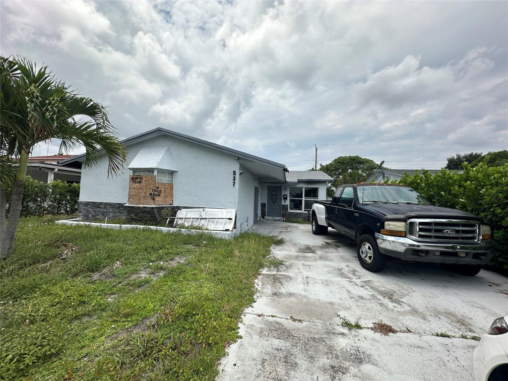 Photo of 537 NW 2nd Terrace, Deerfield Beach, FL 33441 (MLS # F10458801)
