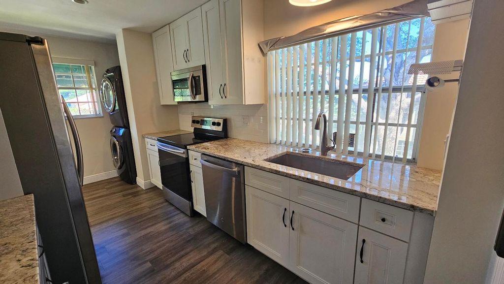 Photo of 6560 Via Regina, Boca Raton, FL 33433 (MLS # R11118571)