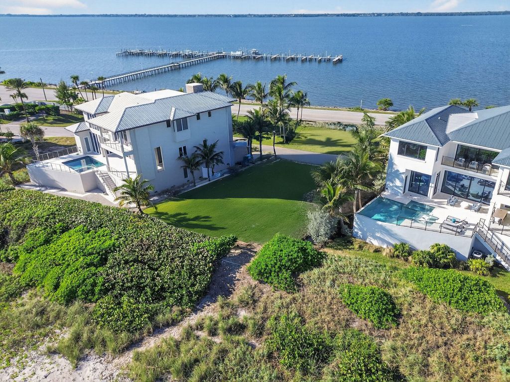 Photo of 8100 S Ocean Drive, Jensen Beach, FL 34957 (MLS # R11149653)