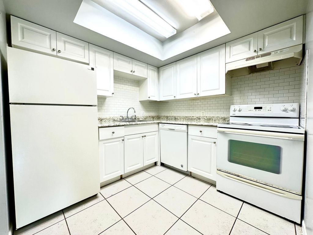 Photo of 3120 Collin Drive #A, West Palm Beach, FL 33406 (MLS # R11021392)