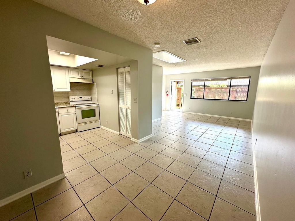 Photo of 3120 Collin Drive #A, West Palm Beach, FL 33406 (MLS # R11021392)