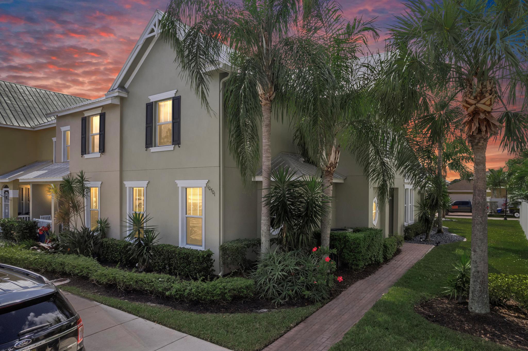 Welcome to your new home in the heart of Tradition! This beautiful 3-bedroom, 2.5-bathroom corner unit townhome offers the perfect blend of comfort, convenience, and community. The primary suite is located on the ground floor, providing ease and privacy, while the two additional bedrooms and loft living space are upstairs - ideal for guests or a growing household. Step outside to your cozy private patio, perfect for morning coffee or weekend cookouts. The home's corner location means extra windows and natural light, giving the space an open and airy feel. Located in a joggable, pedestrian-friendly community, this home is perfect for active lifestyles. Enjoy the tree-lined streets, scenic walking paths, and all that Tradition has to offer: