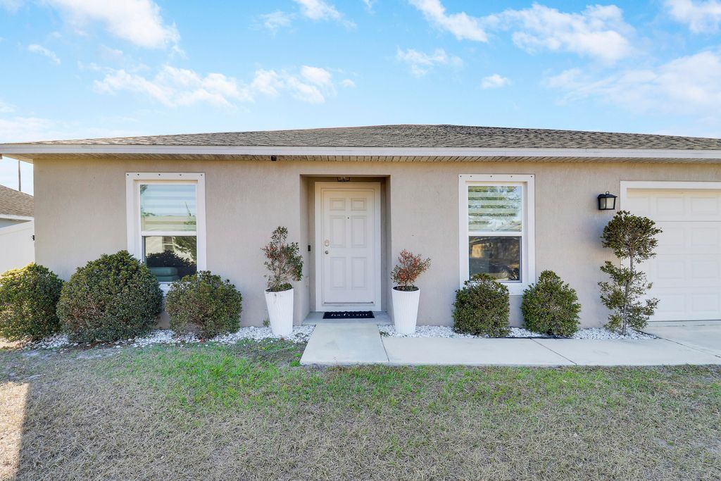 Photo of 3590 SW Vincennes Street, Port Saint Lucie, FL 34953 (MLS # R11161302)