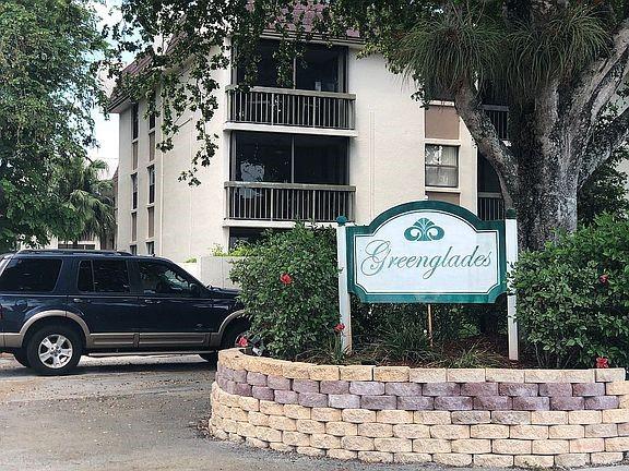 Nice, clean, updated 2 Bed /2 bath condo in Greenglades on the third floor . Spacious dining/living room with tile flooring. New carpet in bedrooms. Kitchen was remodeled in 2016 .Condo has been freshly painted and its move-in ready. Separate laundry with Washer/Dryer in unit . Screened in porch with beautiful pool and garden view to relax and have your morning coffee . Association fee includes water., building insurance, use of clubhouse, pool