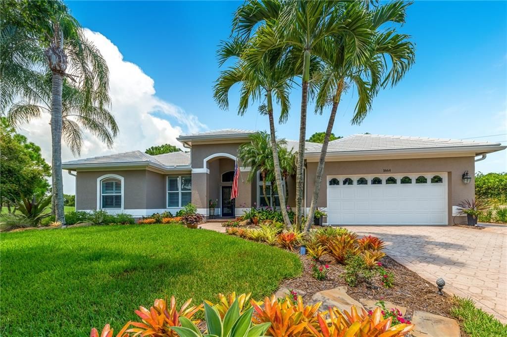 Photo of 1664 SW Cimarron Ct Ct, Palm City, FL 34990 (MLS # F10343151)