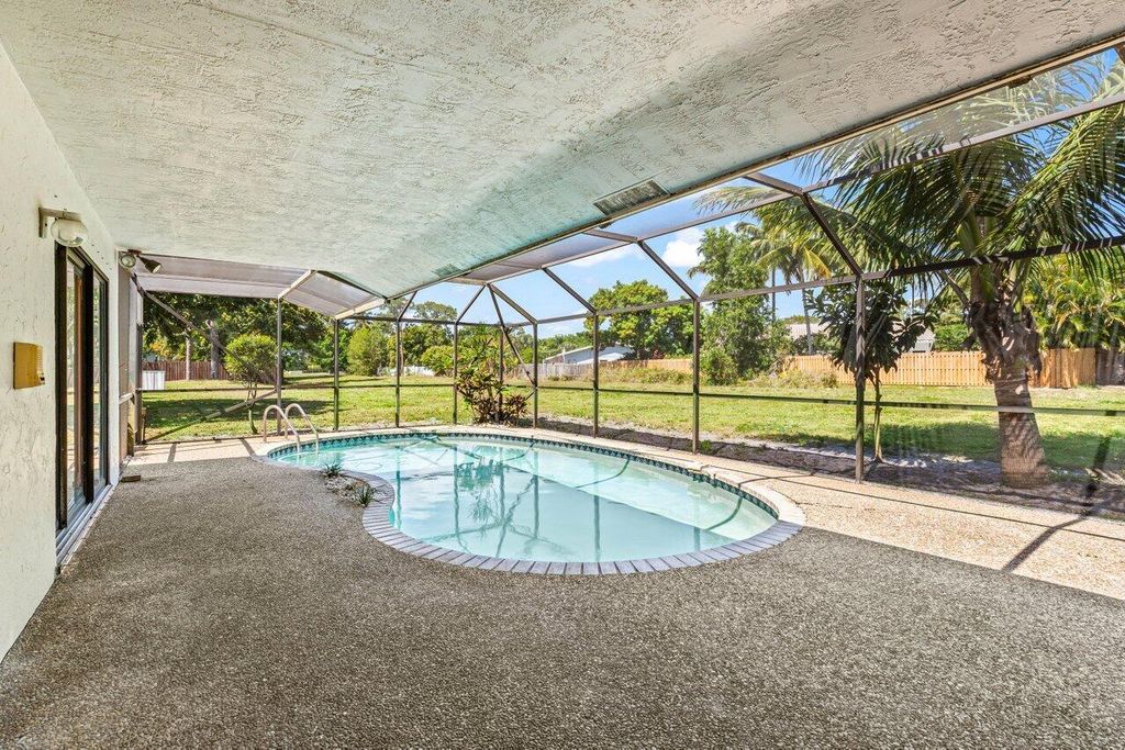 Photo of 3093 NW 28th Terrace, Boca Raton, FL 33434 (MLS # R11071645)