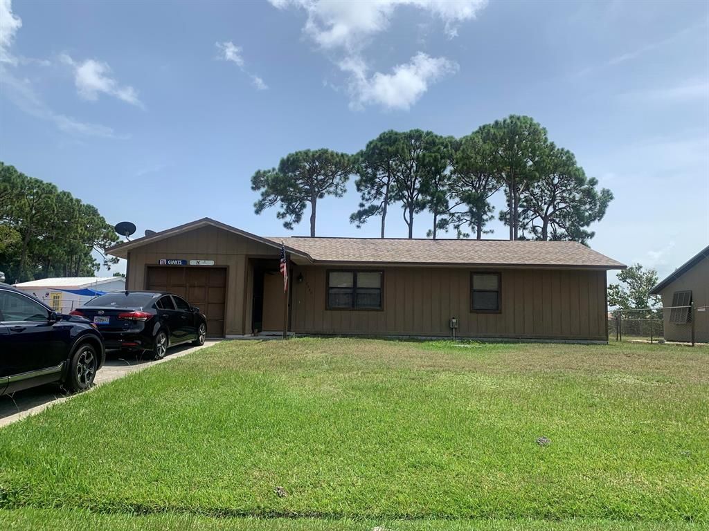 Photo of 2380 SE Harrington Avenue Ave, Port St Lucie, FL 34952 (MLS # R10824298)