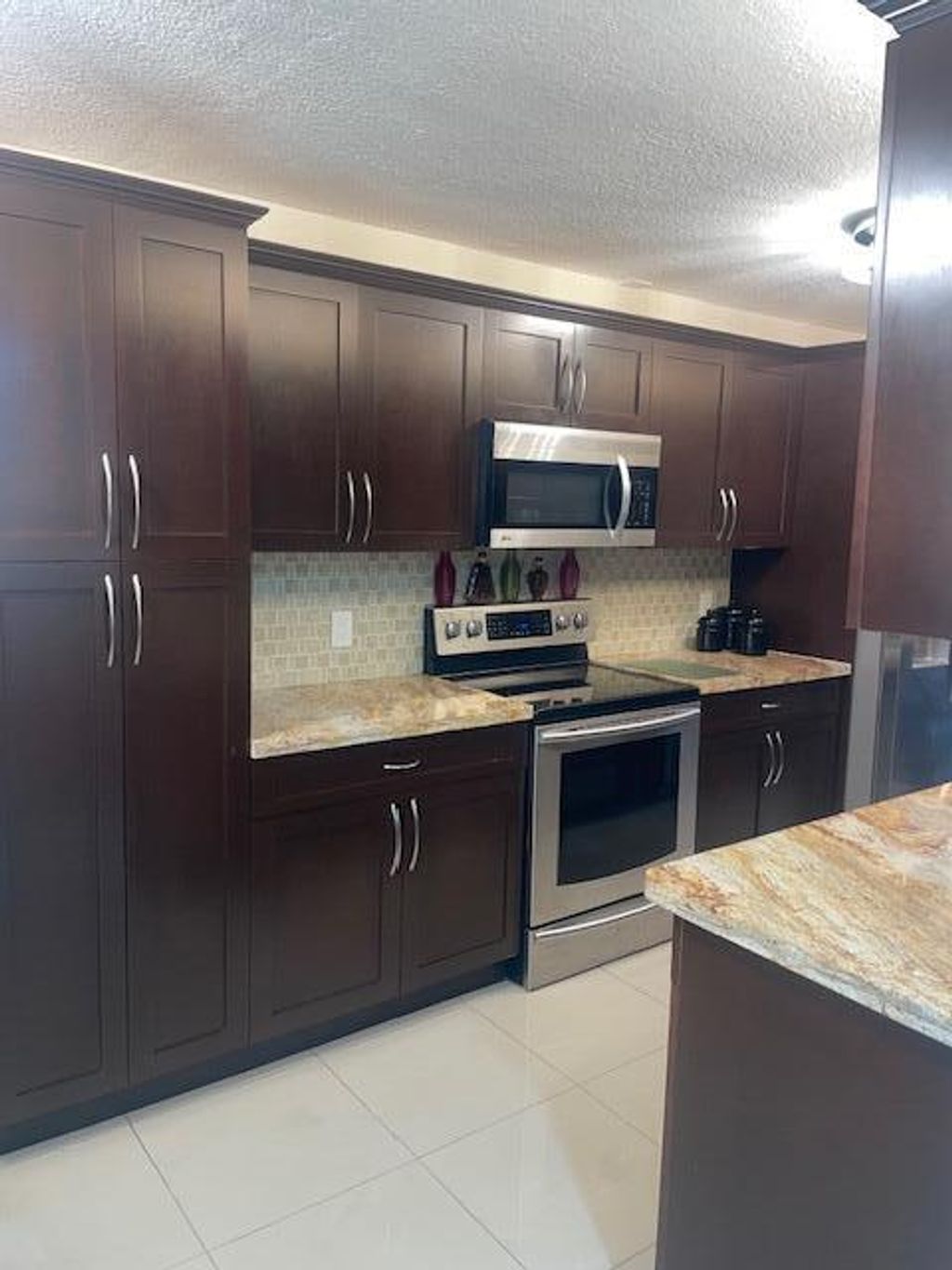 Photo of 1201 SW 128th Terrace #201e, Pembroke Pines, FL 33027 (MLS # B26018333)