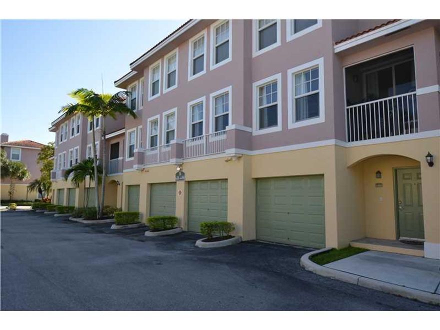 Beautiful 2bd/2.5ba townhome with 1 car garage in gated community if Cypress Pointe located in Coral Springs. All bedrooms are located on the second floor, wood floors, lots of storage room, gourmet kitchen with granite countertops. Washer & Dryer inside. Water/Sewer and trash is included in rent. All occupants over 18 must have a min. 650 credit score and income over $5000/mo. First, last & security is required to move in. COME ENJOY THE RESORT STYLE AMENITIES INCLUDING, POOL, SPA , FITNESS CENTER, BASKET BALL COURTS, BARBECUE AREA, AND KIDS LOT IN THIS GORGEOUS GATED COMMUNITY THAT IS CLOSE TO SHOPPING AND RESTAURANTS, EASY ACCESS TO MAJOR HIGHWAYS.