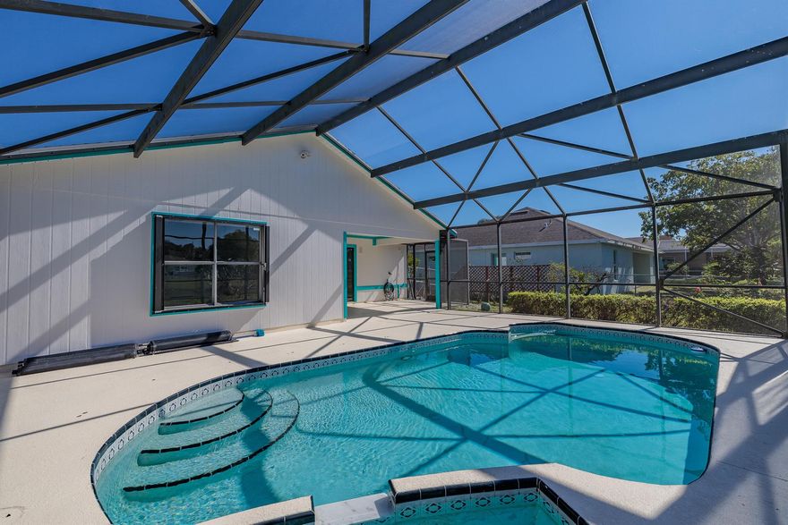 Move-in-ready 3-bedroom, 2-bath single-family pool home with a fully fenced yard, 2021 ROOF and no HOA. This property backs up to a peaceful canal, offering added privacy and a natural backdrop. Inside, the home features bright living spaces, a functional kitchen, and comfortable bedrooms, including a primary suite with its own bath. The fenced backyard is ideal for relaxing, entertaining, or enjoying the pool with serene water views. With no community restrictions, you'll have the flexibility to personalize and make the space your own. Available for immediate occupancy.