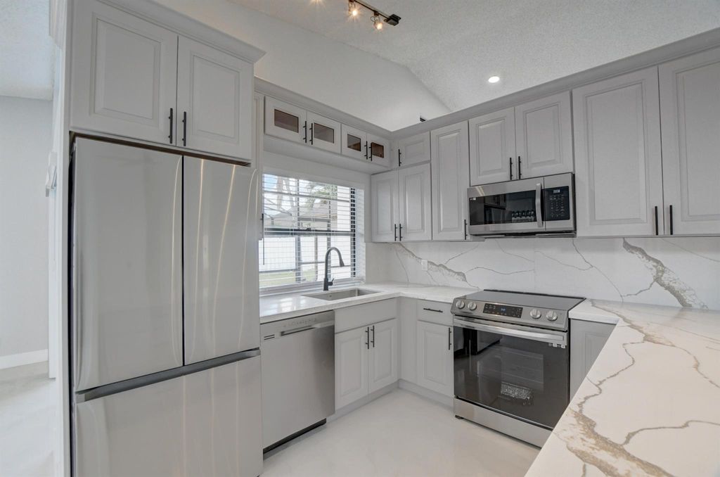 Photo of 20995 Country Creek Drive, Boca Raton, FL 33428 (MLS # R11128427)