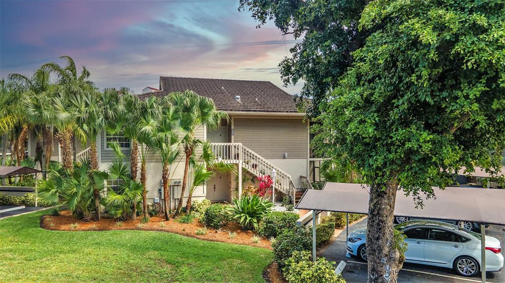 Clean and pristine Key West style condo inside the secure, gated, non-mandatory equity country club of Boca Pointe. This 3/2 1900 sq ft under air home has been updated throughout. New kitchen cabinets, quartz counter tops, stove, 6 ft dual zone wine cooler, washer, dryer, hot water heater etc. Renovated bathrooms with top quality glass shower doors. Huge wrap around deck and sliding glass doors bring the outside inside !! HOA takes care of the entire community maintenance. Perfect for year round or snow bird living.
