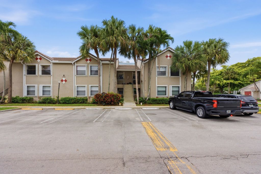 Photo of 9633 Riverside Drive #E3, Coral Springs, FL 33071 (MLS # B26011005)