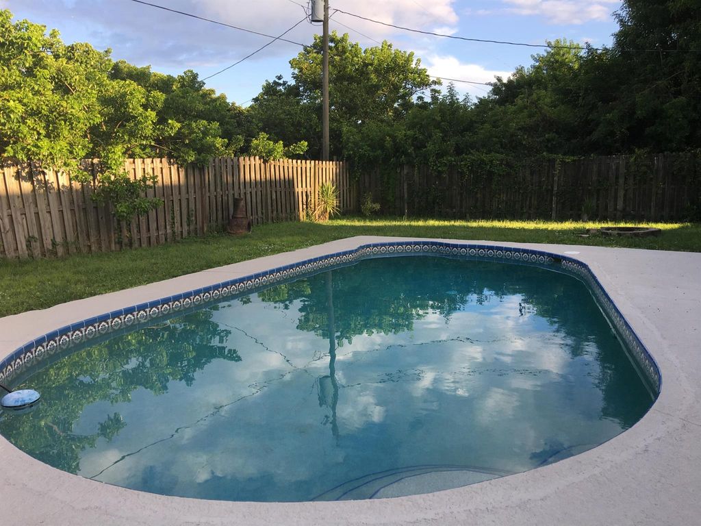 Photo of 2641 SW Eastman Street, Port Saint Lucie, FL 34953 (MLS # R11000732)