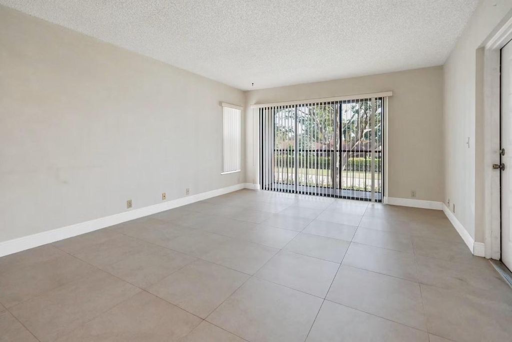 Photo of 802 Sky Pine Way #E2, Greenacres, FL 33415 (MLS # R11148421)