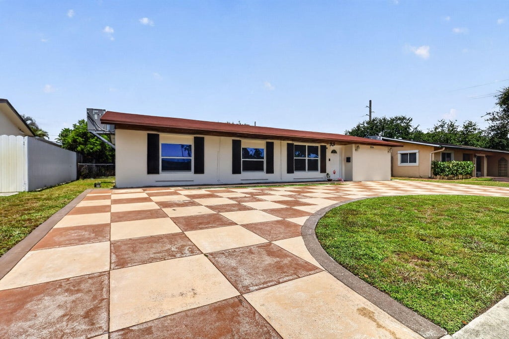 Photo of 2220 N 47th Avenue, Hollywood, FL 33021 (MLS # B26046839)
