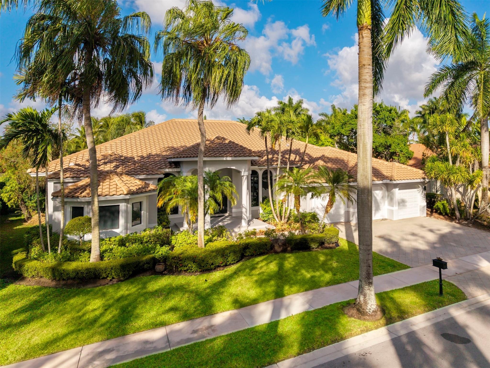 Nestled in the prestigious Weston Hills Community, this meticulously remodeled home features 5 bed, den + 4.5 bath, offering a modern design for a sophisticated lifestyle. The bespoke, modern kitchen invites culinary inspiration and memorable moments. Open floor plan and soaring ceilings, a home bathed in natural light, offering versatile spaces adaptable to any aesthetic. Enjoy views of the lush tropical garden through new impact windows and doors. The breezy patio with a heated pool, ideal for year-round relaxation and entertaining. An integrated 3-car garage and the NEW ROOF enhances this extraordinary home . Embrace the exclusive Weston lifestyle, Golf Club, sports and recreation for all family. A bicycle-friendly city, excellent schools, restaurants & luxury shopping nearby.
