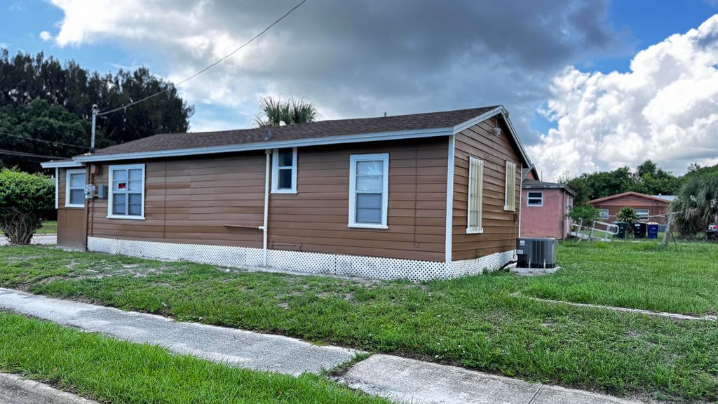 Photo of 713 N 19th Street, Fort Pierce, FL 34950 (MLS # R11048138)