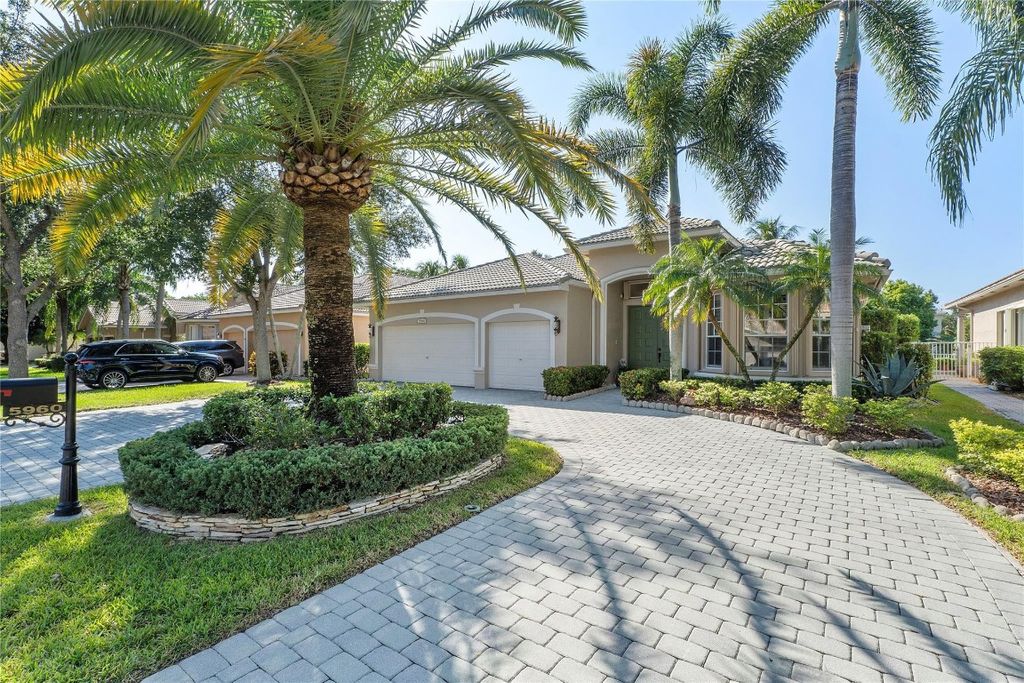 Photo of 5960 NW 56th Drive, Coral Springs, FL 33067 (MLS # F10455690)