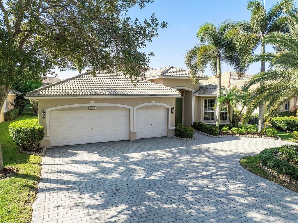 Photo of 5960 NW 56th Drive, Coral Springs, FL 33067 (MLS # F10455690)