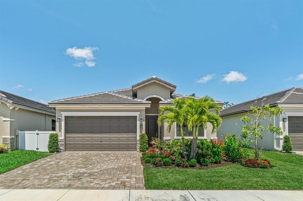 Photo of 7467 Moonrise Drive, Lake Worth, FL 33467 (MLS # R10803185)