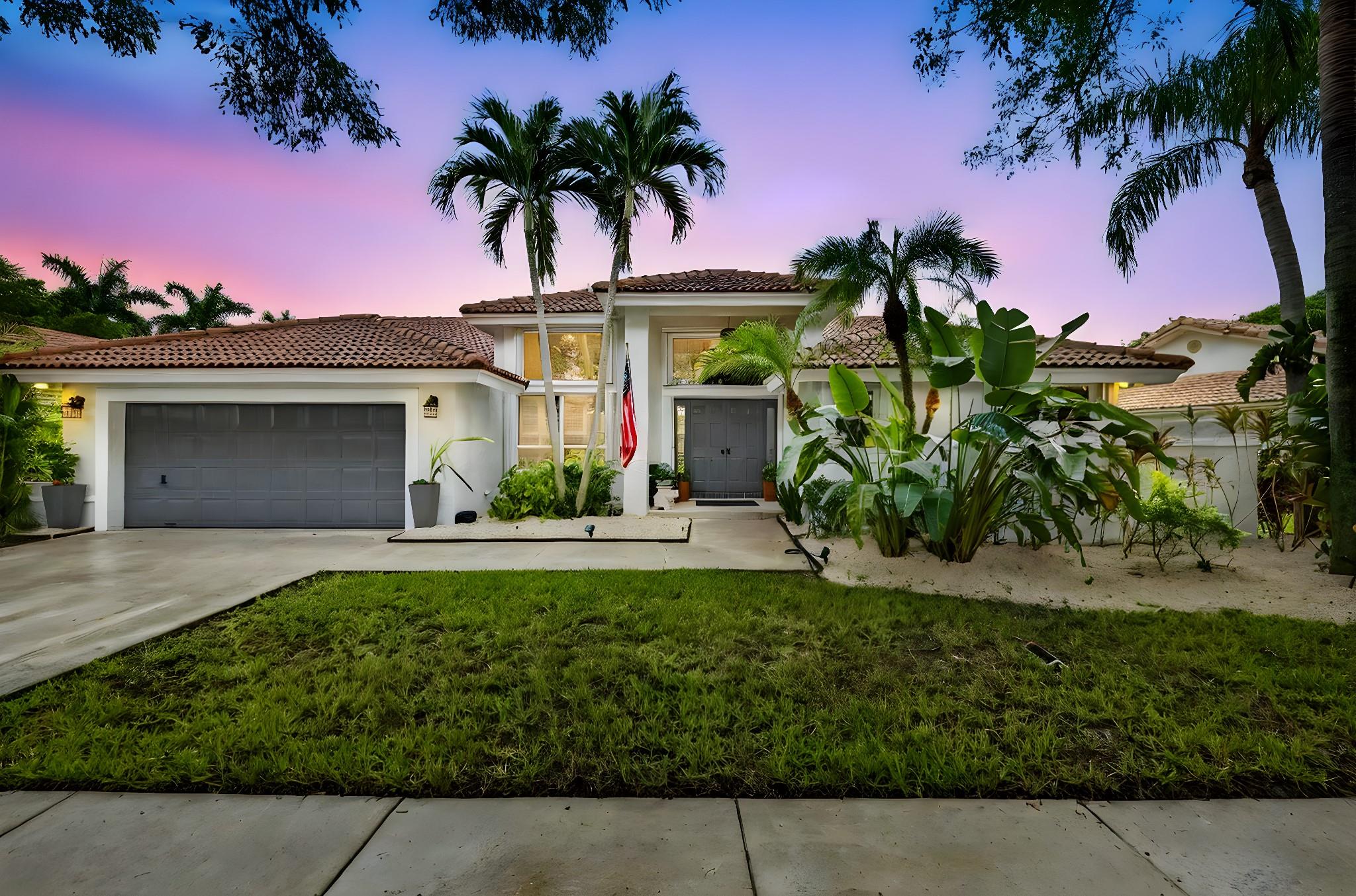 Beautiful lakefront home with a renovated pool & screened patio lies in the gated community of Sunset Springs. The updated, open concept kitchen overlooks a large family room. Offering updated granite bathrooms, & a split bedroom floorplan, this well-maintained home is flooded with natural light & presents easy entertaining & features a large Master Bedroom overlooking the pool & tranquil lake. Two walk-in closets lead to a gorgeous Master Bathroom which showcases his & hers sinks & a Roman tub. Other delightful features include Plantation Shutters throughout the home, fresh exterior paint & a large, covered patio. Roof completely redone in 2008, new Trane A/C 2018, tankless hot water heater 2022, updated appliances & new pool pump, Accordion Shutters. A+ schools! Flooring Credit $10,000!!