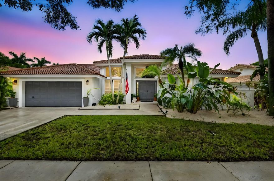 Beautiful lakefront home with a renovated pool & screened patio lies in the gated community of Sunset Springs. The updated, open concept kitchen overlooks a large family room. Offering updated granite bathrooms, & a split bedroom floorplan, this well-maintained home is flooded with natural light & presents easy entertaining & features a large Master Bedroom overlooking the pool & tranquil lake. Two walk-in closets lead to a gorgeous Master Bathroom which showcases his & hers sinks & a Roman tub. Other delightful features include Plantation Shutters throughout the home, fresh exterior paint & a large, covered patio. Roof completely redone in 2008, new Trane A/C 2018, tankless hot water heater 2022, updated appliances & new pool pump, Accordion Shutters. A+ schools! Flooring Credit $10,000!!