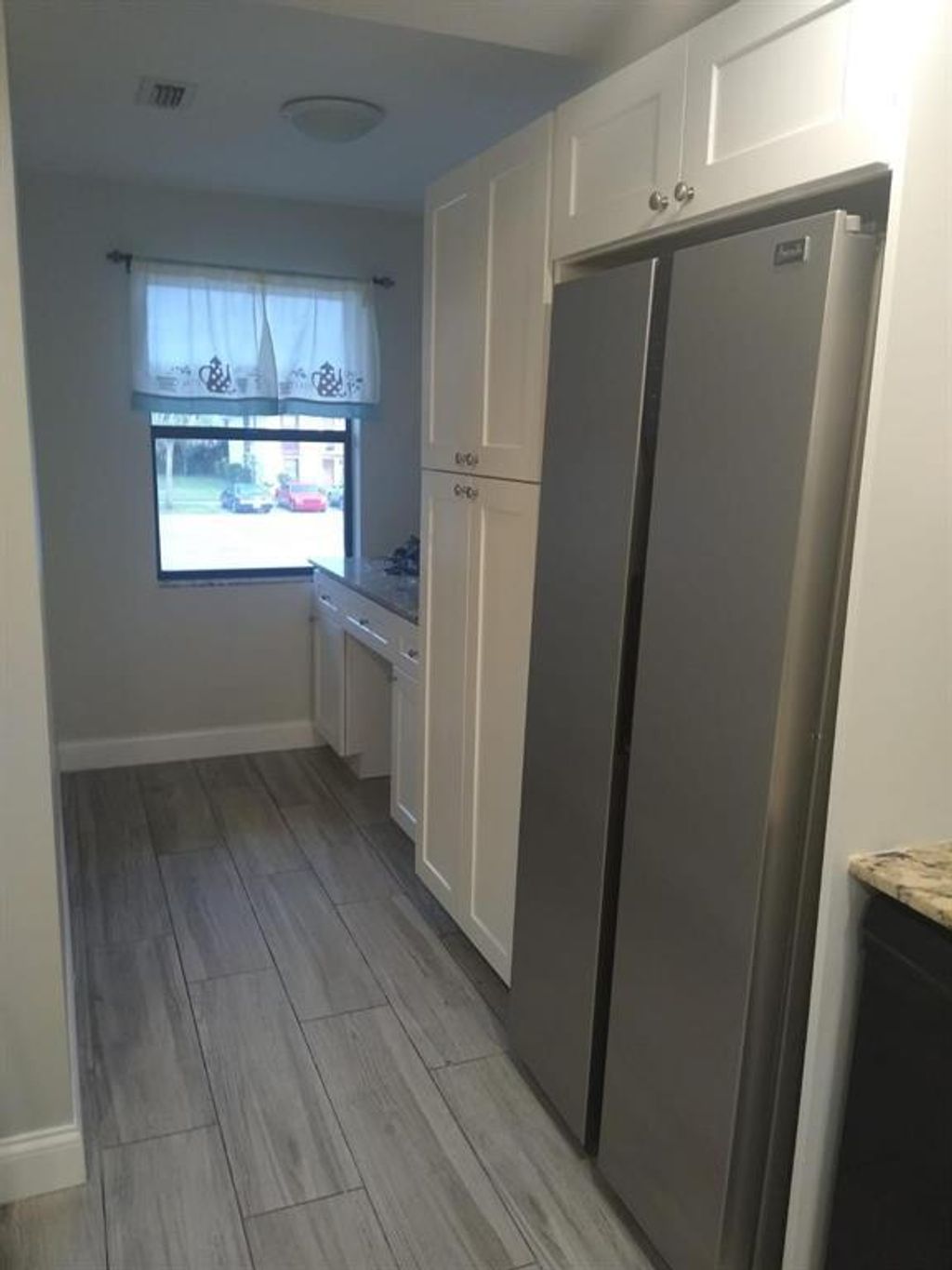 Photo of 5985 Forest Hill Boulevard #205, West Palm Beach, FL 33415 (MLS # B26000014)