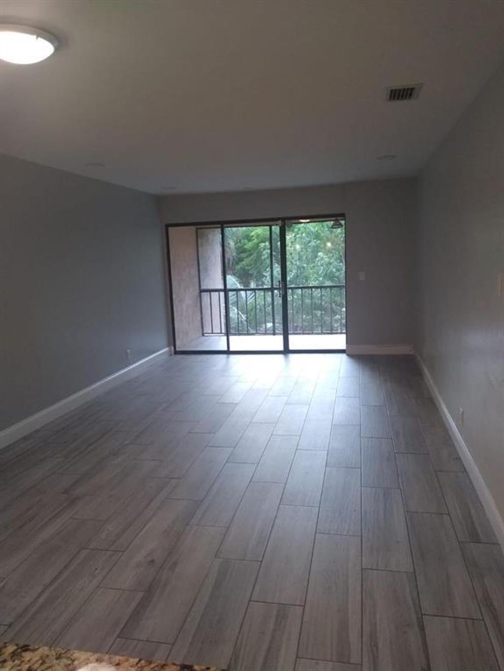 Photo of 5985 Forest Hill Boulevard #205, West Palm Beach, FL 33415 (MLS # B26000014)