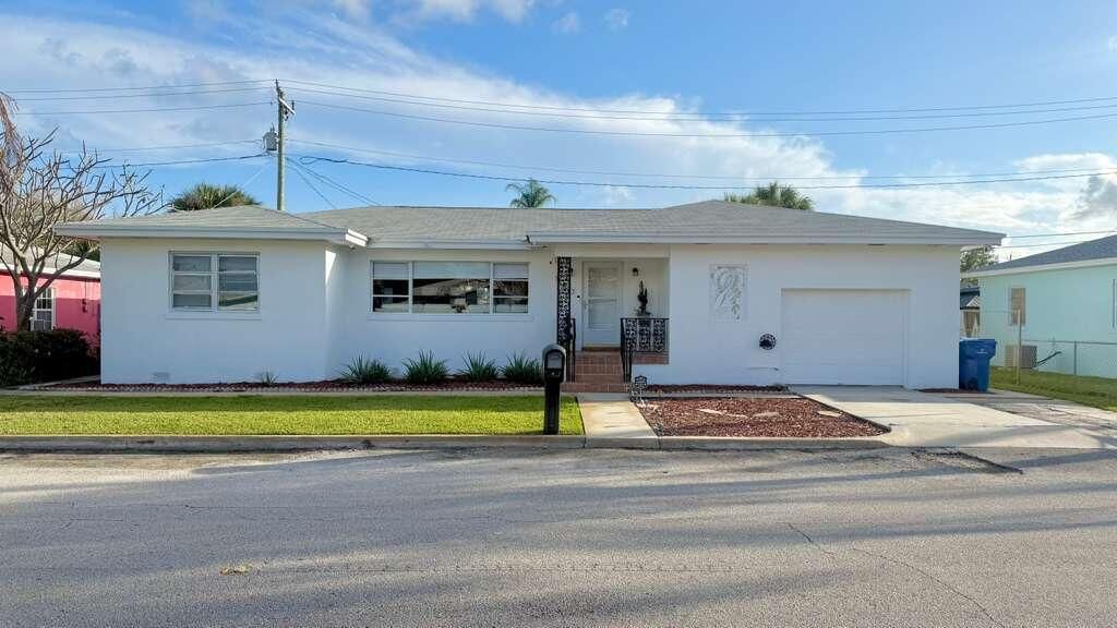 Photo of 147 E 28th Street E, Riviera Beach, FL 33404 (MLS # R11168755)