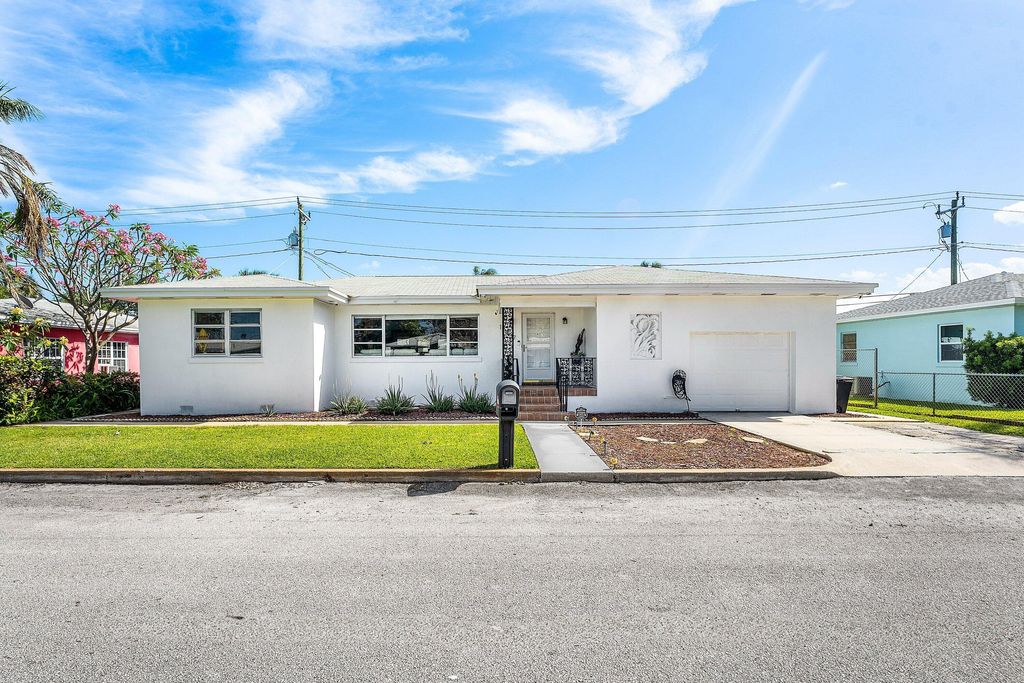 Photo of 147 E 28th Street E, Riviera Beach, FL 33404 (MLS # R11168755)